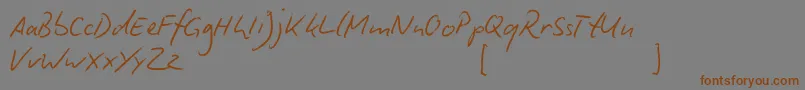 BiroScript Font – Brown Fonts on Gray Background