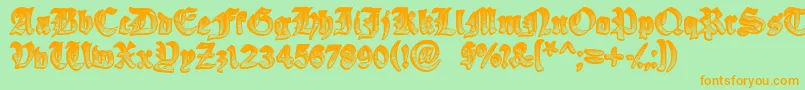 フォントYeOldeOak – オレンジの文字が緑の背景にあります。