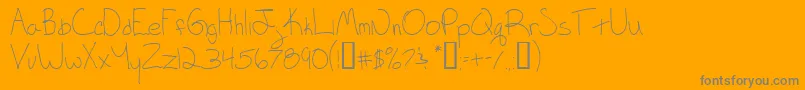 Keagan-Schriftart – Graue Schriften auf orangefarbenem Hintergrund