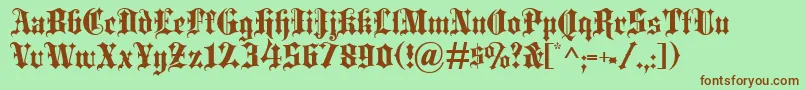 Więcej informacji o czcionce Blackletter Czcionka Blackletter – brązowe czcionki na zielonym tle