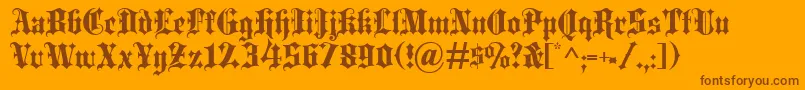 Blackletter-Schriftart – Braune Schriften auf orangefarbenem Hintergrund