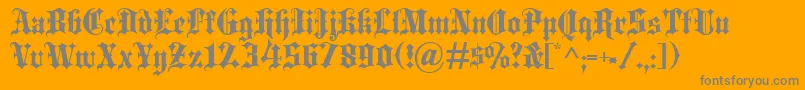 Blackletter-Schriftart – Graue Schriften auf orangefarbenem Hintergrund