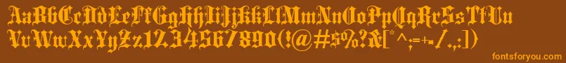 Fonte Blackletter – fontes laranjas em um fundo marrom