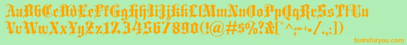 Blackletter-Schriftart – Orangefarbene Schriften auf grünem Hintergrund