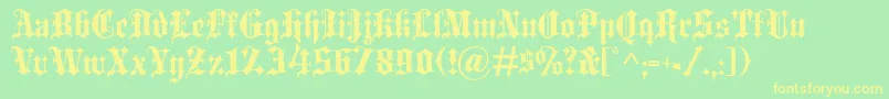Blackletter-Schriftart – Gelbe Schriften auf grünem Hintergrund