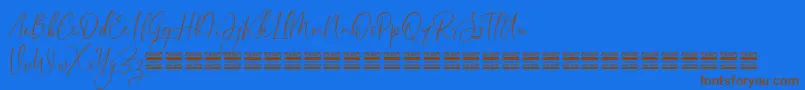 SheilazainDemo Font – Brown Fonts on Blue Background