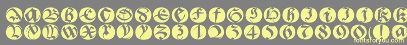 Bastardabuttonsbeta Font – Yellow Fonts on Gray Background