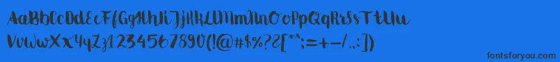 Movusbrushpen Font – Black Fonts on Blue Background