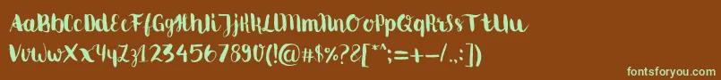 フォントMovusbrushpen – 緑色の文字が茶色の背景にあります。