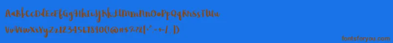 フォントAvocadoLime – 茶色の文字が青い背景にあります。