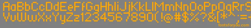 フォントFieryTurk – オレンジの文字は灰色の背景にあります。