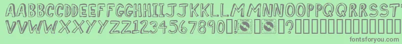 Comiz Font – Gray Fonts on Green Background
