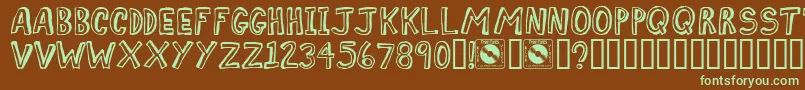 Comiz Font – Green Fonts on Brown Background