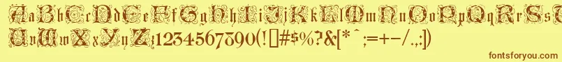 LombardinaInitialOne-fontti – ruskeat fontit keltaisella taustalla
