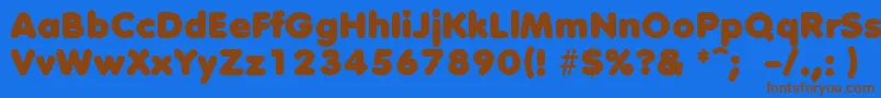 フォントDebussyLengyar – 茶色の文字が青い背景にあります。