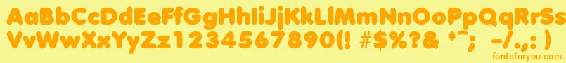 フォントDebussyLengyar – オレンジの文字が黄色の背景にあります。