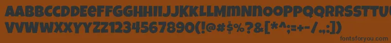 Шрифт Luckiestguy – чёрные шрифты на коричневом фоне