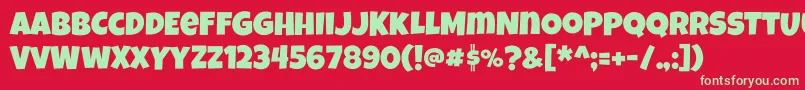 Luckiestguy-Schriftart – Grüne Schriften auf rotem Hintergrund