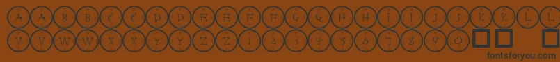 101clockface Font – Black Fonts on Brown Background