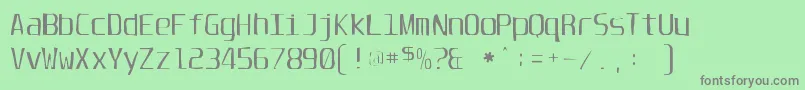 フォントUnispacegaunt – 緑の背景に灰色の文字