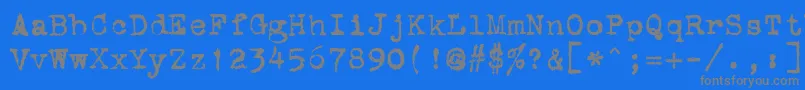 フォントStOldTypewriter – 青い背景に灰色の文字
