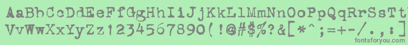 フォントStOldTypewriter – 緑の背景に灰色の文字