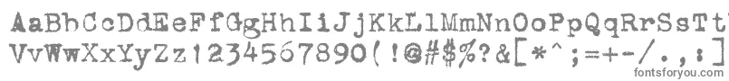 フォントStOldTypewriter – 白い背景に灰色の文字