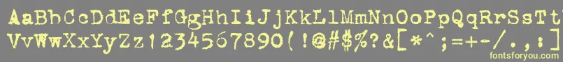 StOldTypewriter Font – Yellow Fonts on Gray Background