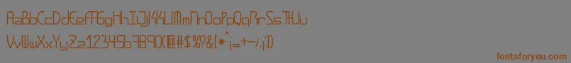 フォントAmplitudes – 茶色の文字が灰色の背景にあります。