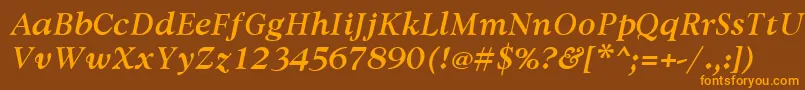 AvdiraBoldItalic Font – Orange Fonts on Brown Background