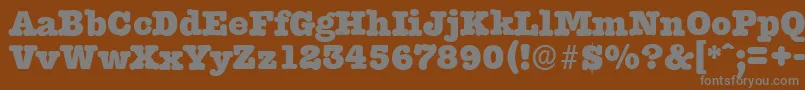 Czcionka TypewriterserialHeavyRegular – szare czcionki na brązowym tle