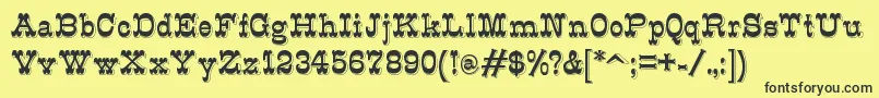 K22Eclair Font – Black Fonts on Yellow Background