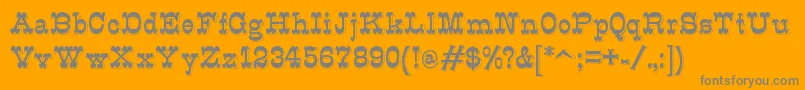 K22Eclair-Schriftart – Graue Schriften auf orangefarbenem Hintergrund