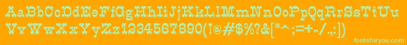 K22Eclair Font – Green Fonts on Orange Background