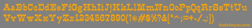 K22Eclair Font – Orange Fonts on Gray Background