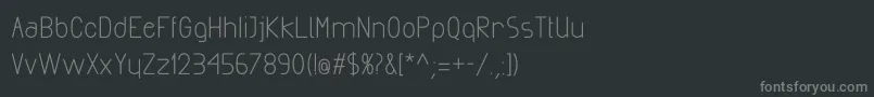 フォントExactaBold – 黒い背景に灰色の文字