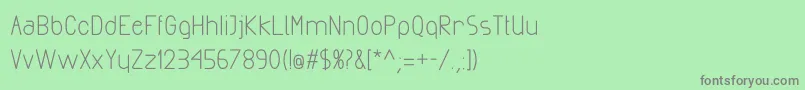 フォントExactaBold – 緑の背景に灰色の文字