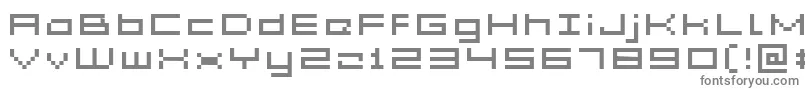 Acme5WideXtnd-fontti – harmaat kirjasimet valkoisella taustalla