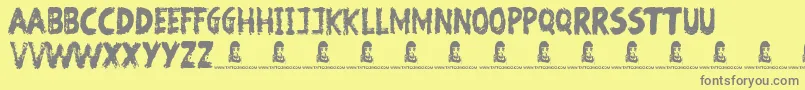 Fonte BewareOfTheZombies – fontes cinzas em um fundo amarelo