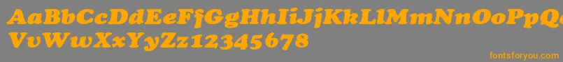 フォントCooperextHeavyItalic – オレンジの文字は灰色の背景にあります。
