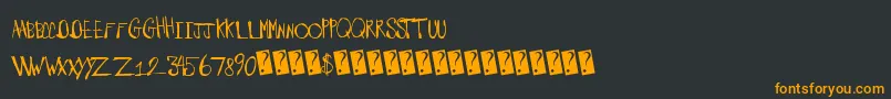 Шрифт Barnyardmassacre – оранжевые шрифты на чёрном фоне