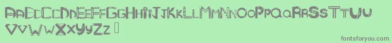 Mandmtribal Font – Gray Fonts on Green Background