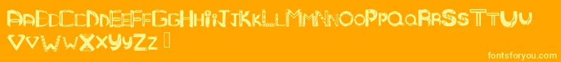 Mandmtribal-Schriftart – Gelbe Schriften auf orangefarbenem Hintergrund