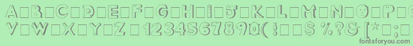 CrazyCreaturesNormal Font – Gray Fonts on Green Background