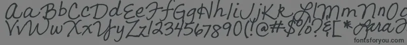 LarasLetters Font – Black Fonts on Gray Background