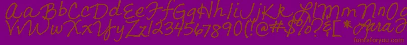 フォントLarasLetters – 紫色の背景に茶色のフォント