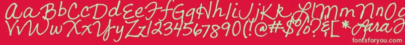 フォントLarasLetters – 赤い背景に緑の文字