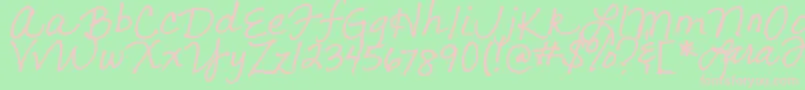 フォントLarasLetters – 緑の背景にピンクのフォント