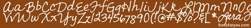 LarasLetters-fontti – valkoiset fontit ruskealla taustalla