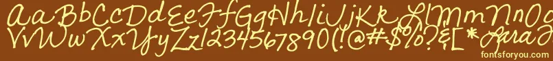 LarasLetters Font – Yellow Fonts on Brown Background